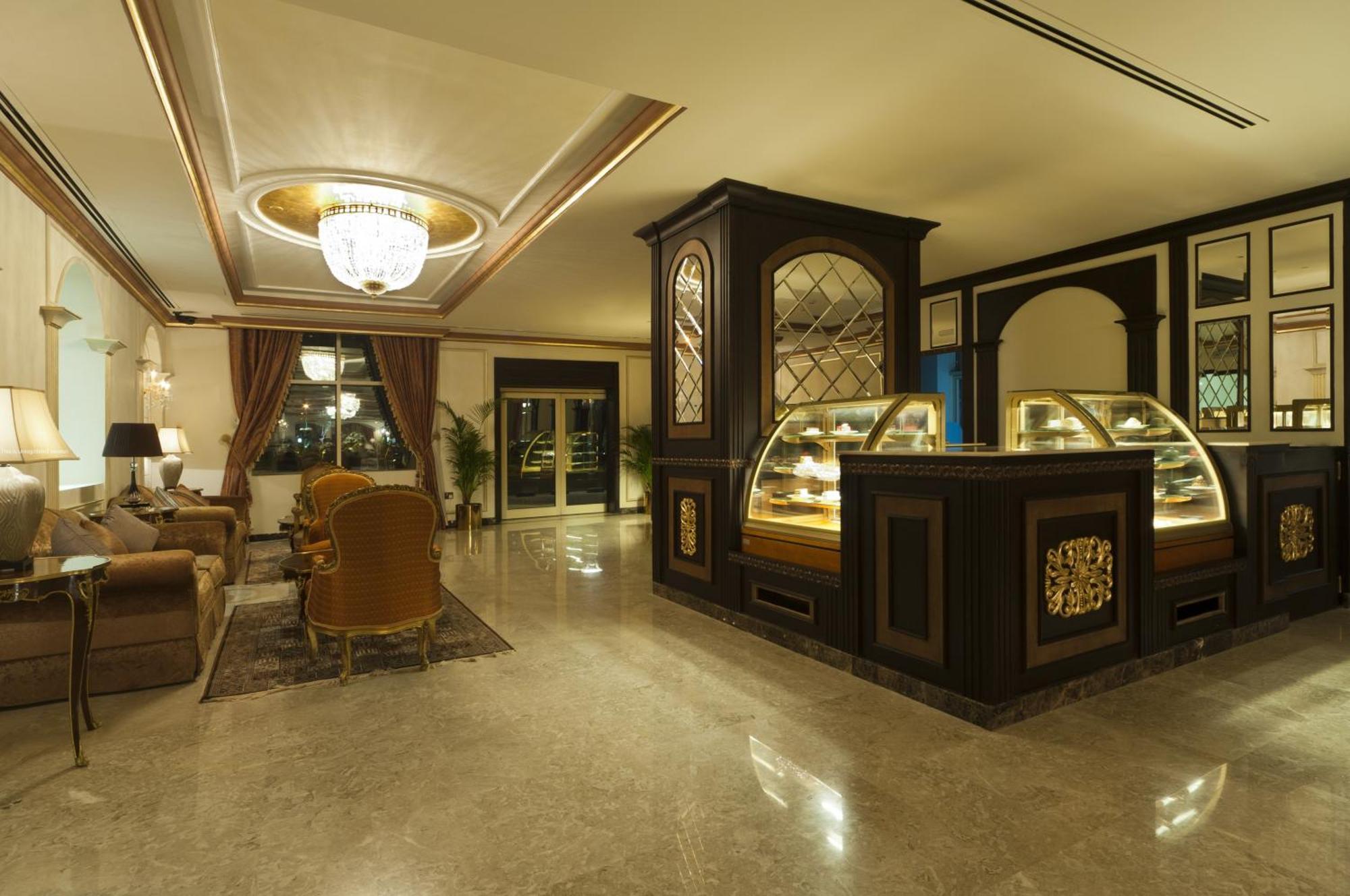 דוחה Magnum Hotel & Suites West Bay מראה פנימי תמונה